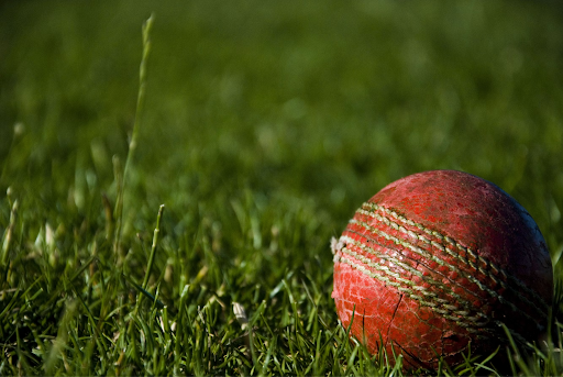 https://unsplash.com/photos/shallow-focus-photography-of-red-cricket-ball-oDs_AxeR5g4